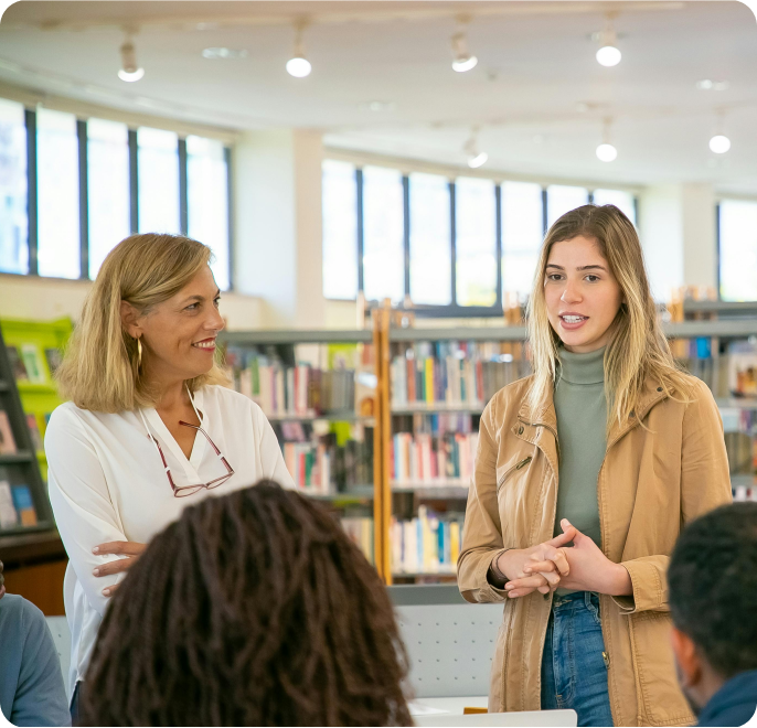 People discussing in a library